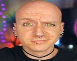 The star has various piercing in his nose, lips, ears, and eyebrow The star has various piercing in his nose, lips, ears, and eyebrow.